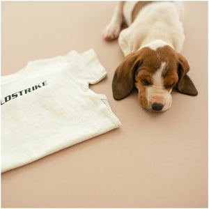 ColdStrike cream onesie front side and dog